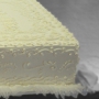 Torta con alzata in polistirolo a forma di rettangolo